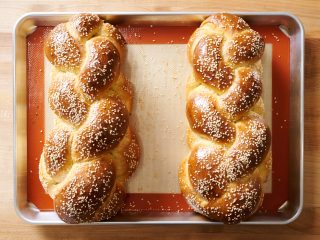 The Perfect Loaf's sourdough challah topped with sesame seeds.