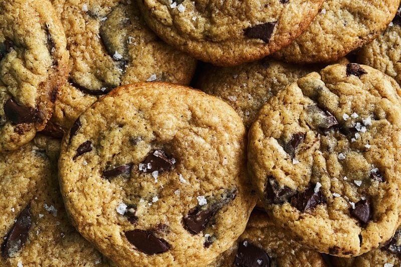 Sourdough starter discard chocolate chip cookies in a pile