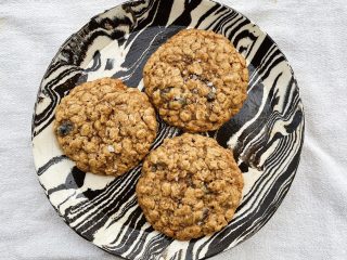Sourdough discard oatmeal raisin cookies on a plate.